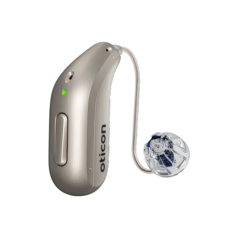 Un audífono avanzado Oticon Reveal™ 1 de color beige, con un auricular transparente y una pequeña luz indicadora verde, mostrado sobre un fondo blanco. Este dispositivo cuenta con reducción de ruido mediante inteligencia artificial para ofrecer una experiencia auditiva mejorada.