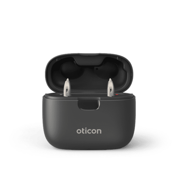 Oticon SmartCharger, imagen frontal, cargador abierto, audífonos grises, LED, Audífonos con servicio ilimitado Auzen 